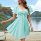 🥳2026 HOT SALE🥳💞50K+ SOLD!👗🎀 50% OFF! Puff Sleeve Backless Bow Tie Dress – Twist-front, A-line silhouette. Flattering & breathable. Perfect for summer parties or holidays. 🌸✨